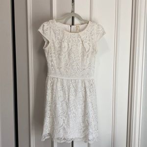 White eyelet style short dress with cap sleeves